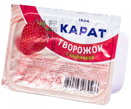 Творожный продукт "Творожок" терм. фрукт. с наполн. «Клубника» м.д.ж. 9% Карат 100 г
